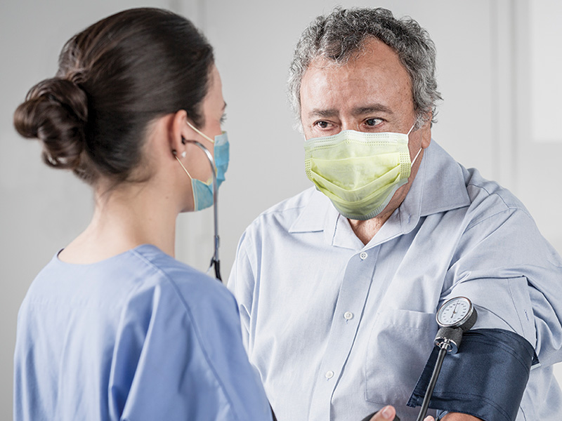 Provider taking blood pressure