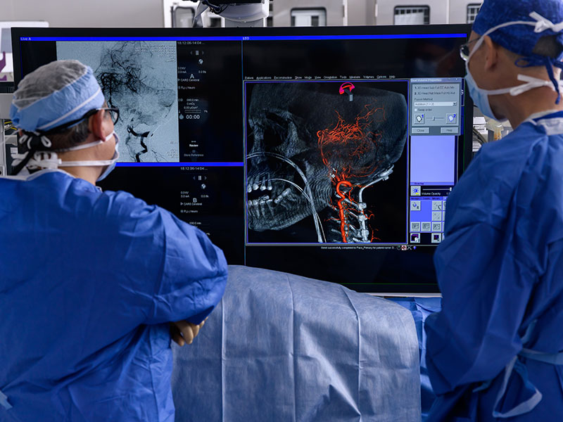 Two doctors looking at stroke scans