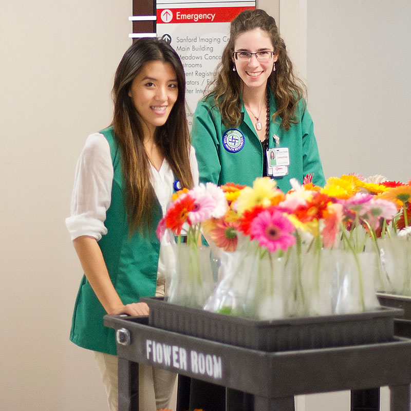 Junior Volunteers delivering flowers