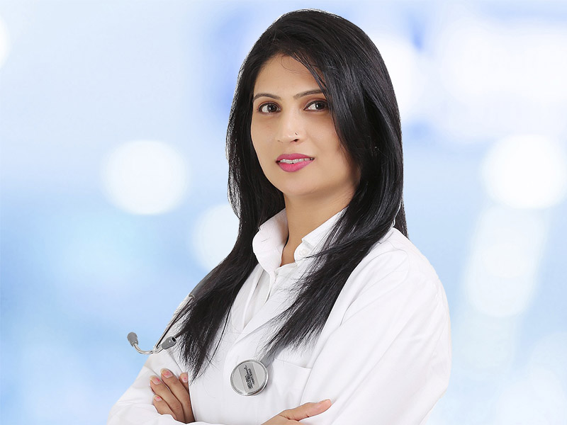 Female Doctor Smiling with Arms Folded