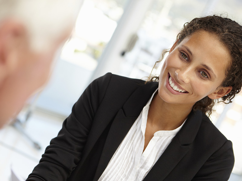 Man and Woman Talking During Interview