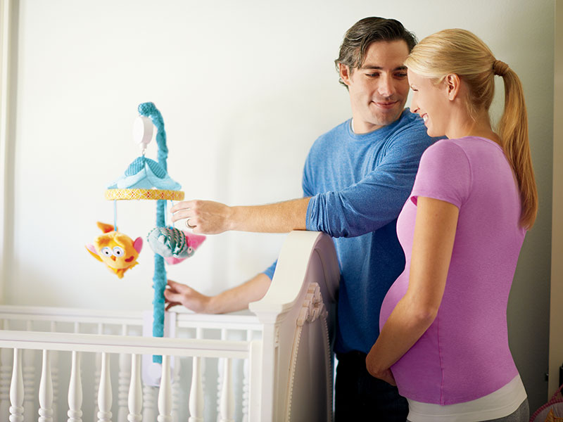 Couple Decorating Crib