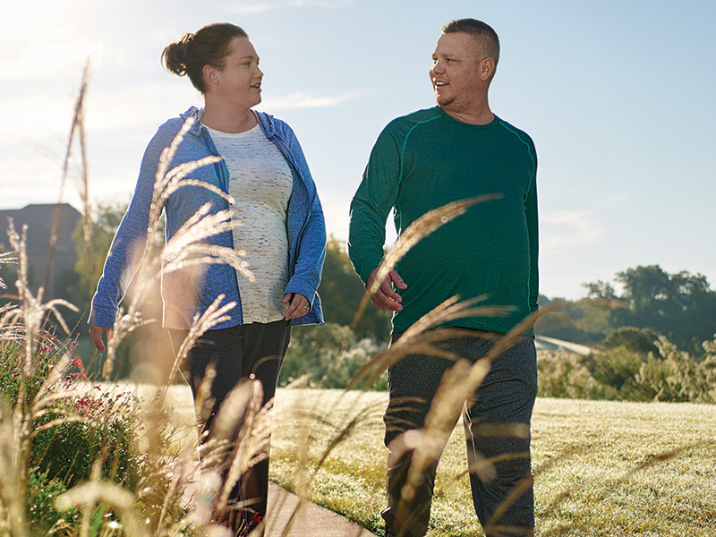 Couple walking outside