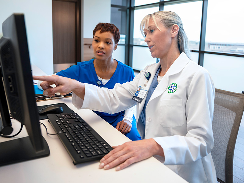 Doctor and nurse at computer