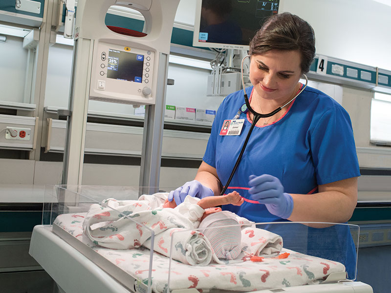 Female Nurse with Infant