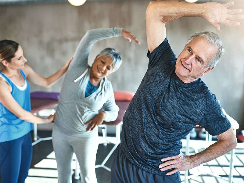 Man and woman doing yoga