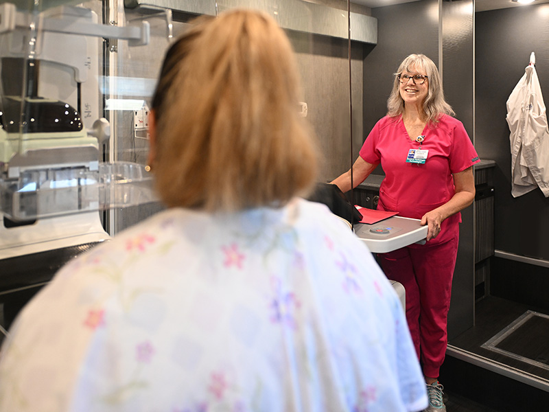 Patient getting mammogram at mobile health unit