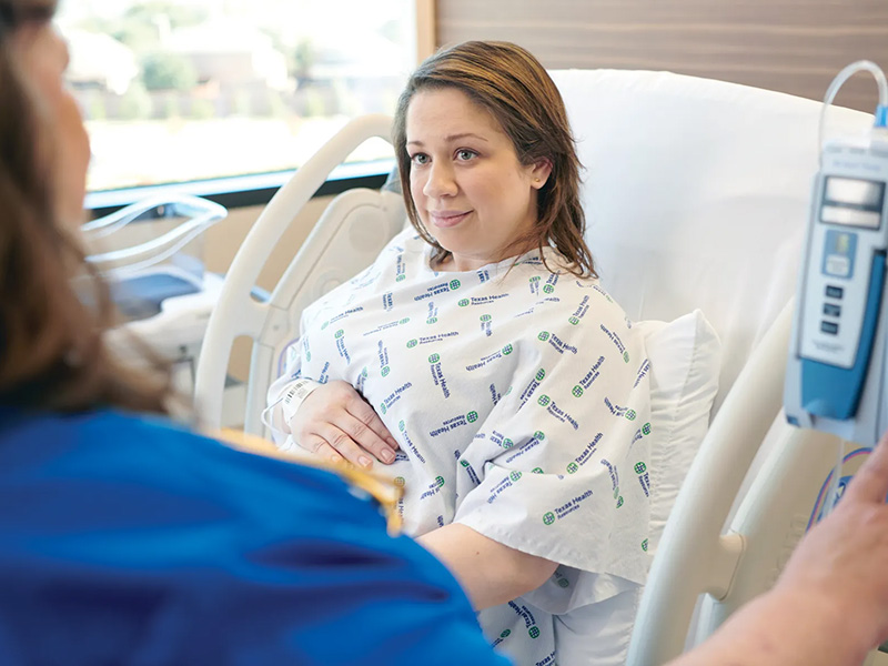 Pregnant mom in hospital bed