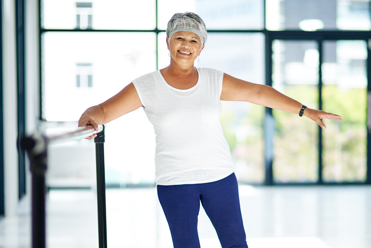 Woman exercising at Barre