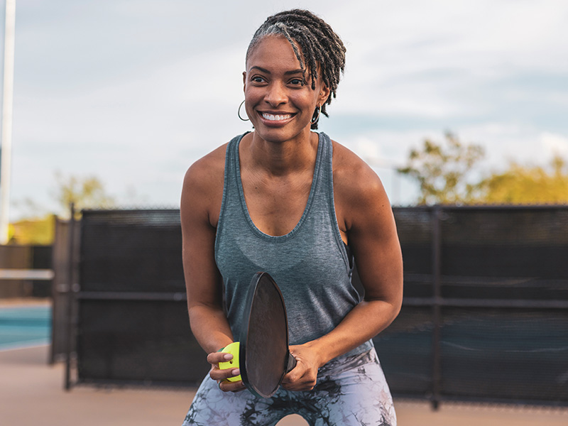 Woman playing pickleball