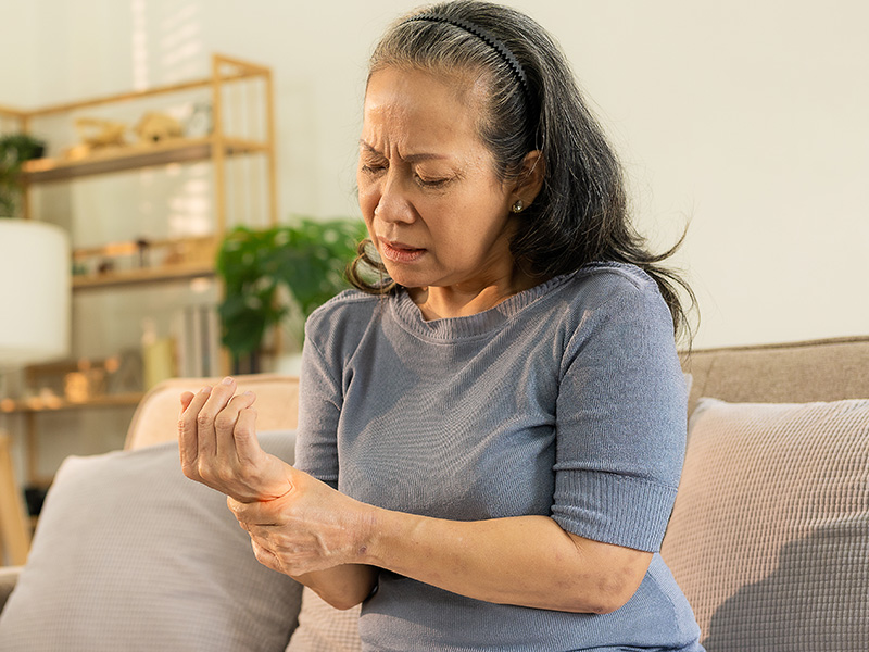 Woman with hand pain