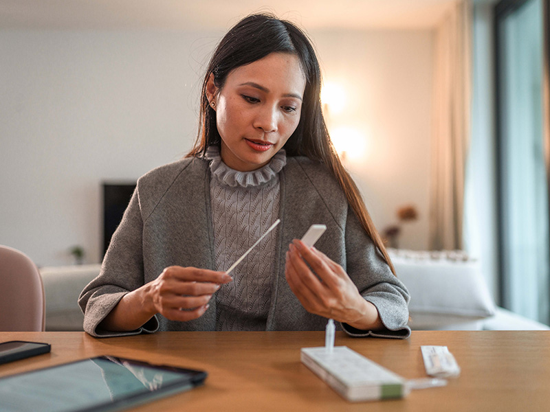 Woman with At-Home COVID Test