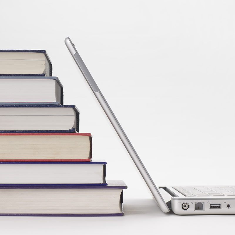 Laptop and books