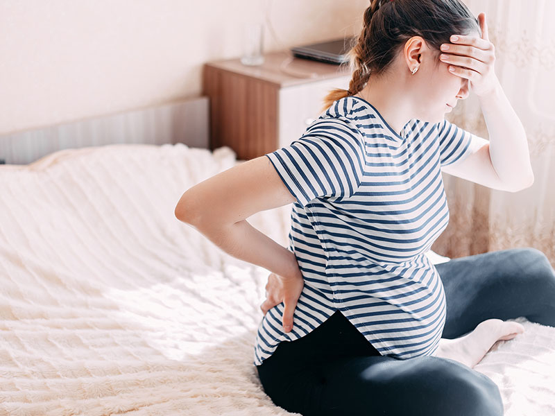 Pregnant woman with back pain