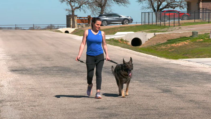 Kassidy Freeman walks her dog