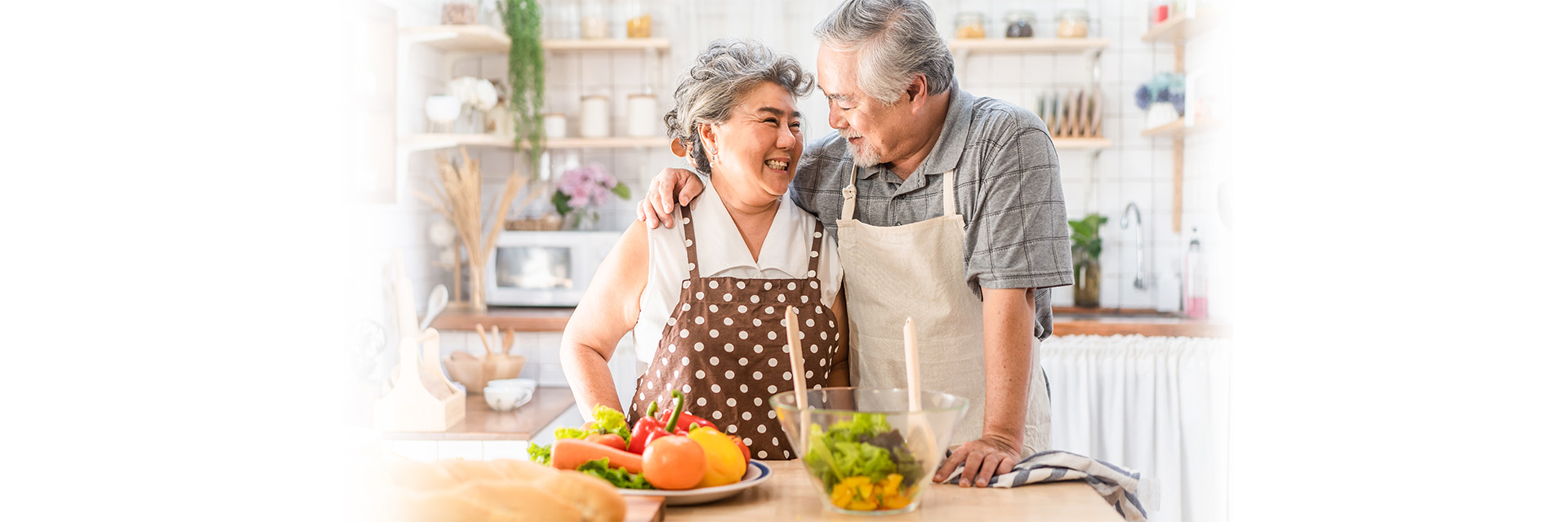 Couple cooking healthy in kitchen