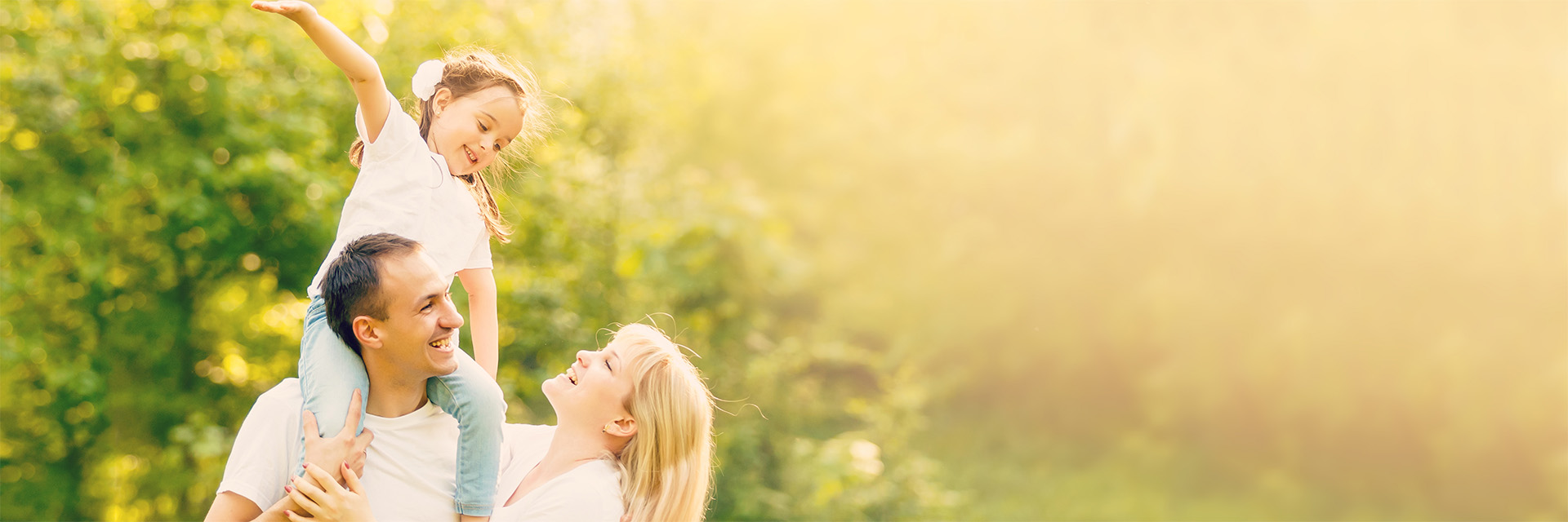 Family outdoors in sunshine