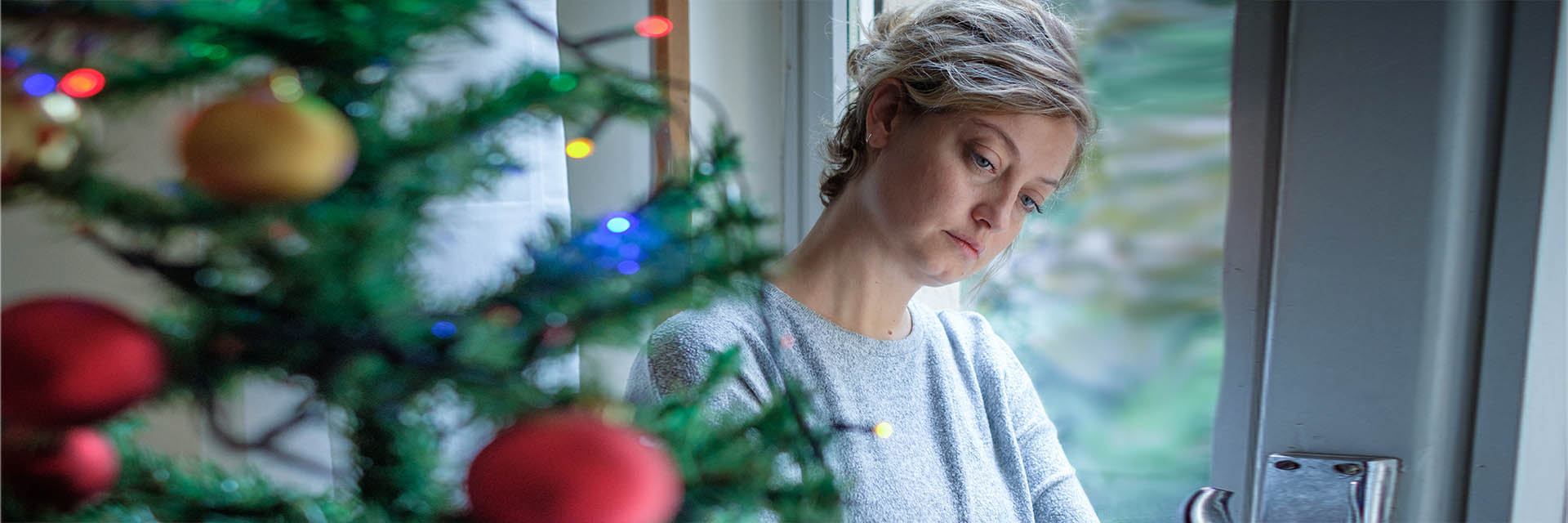 Woman looking sad during the hoidays