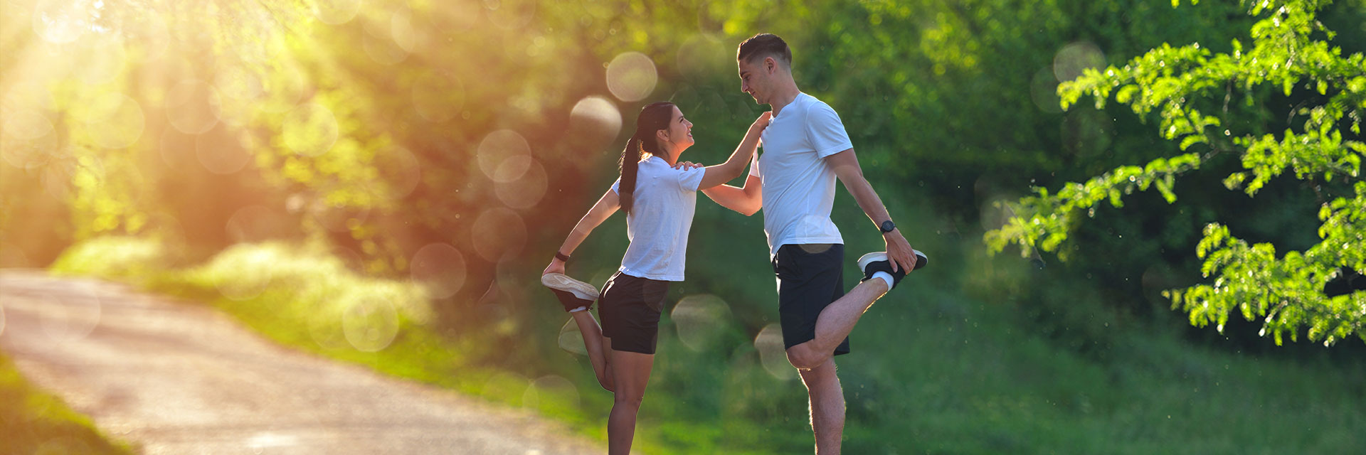 Young couple stretching outdoors