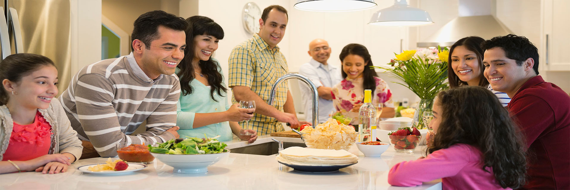 Large family having a celebration with food