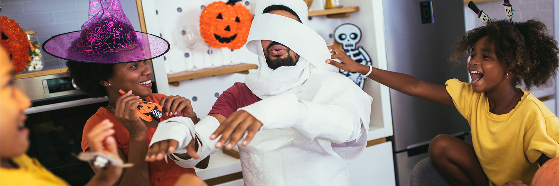 Family getting dressed fo rHalloween