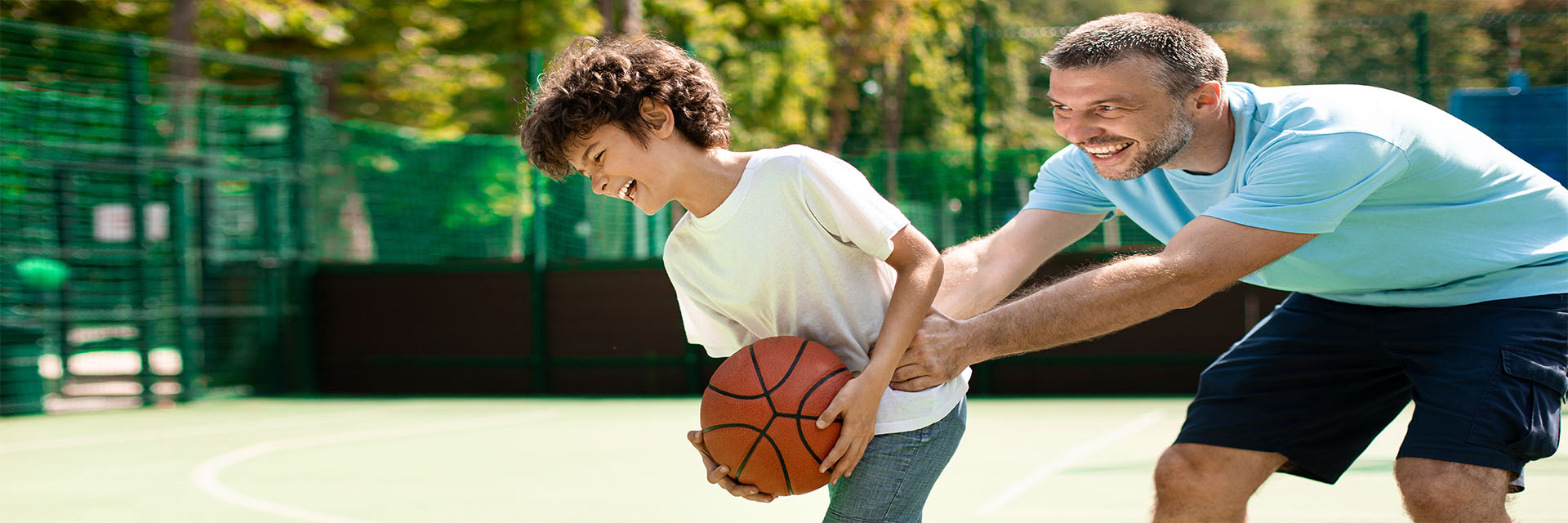 Father and son bonding with basketball