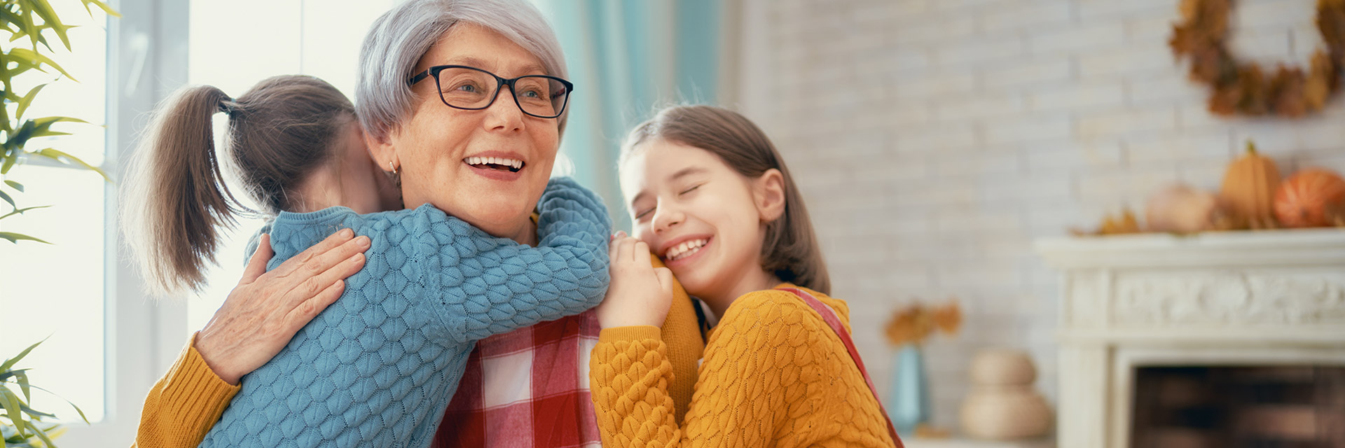 Grandmother hugging children