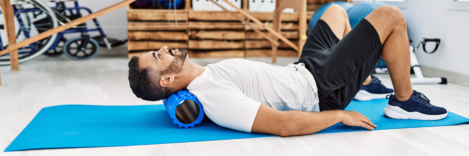 Man doing physical therapy and smiling