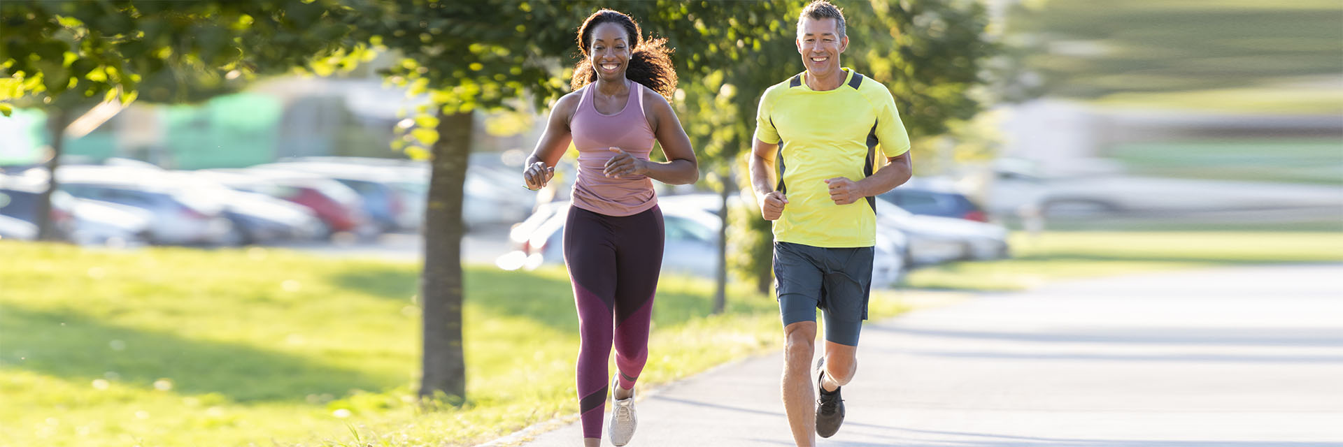 Man and woman running outdoors