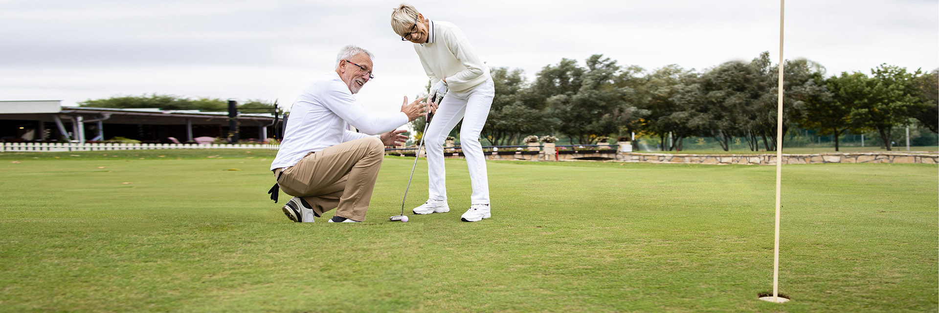 Mature couple on the golf course
