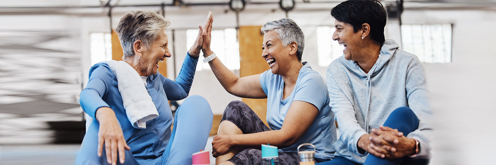 mature women celebrating after gym class