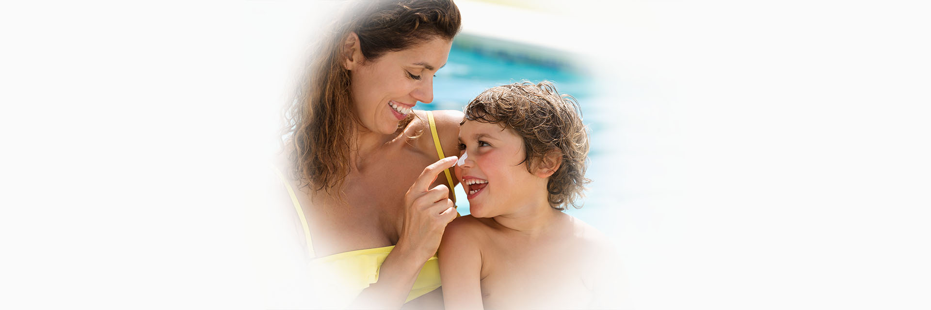 Mom and son in a pool