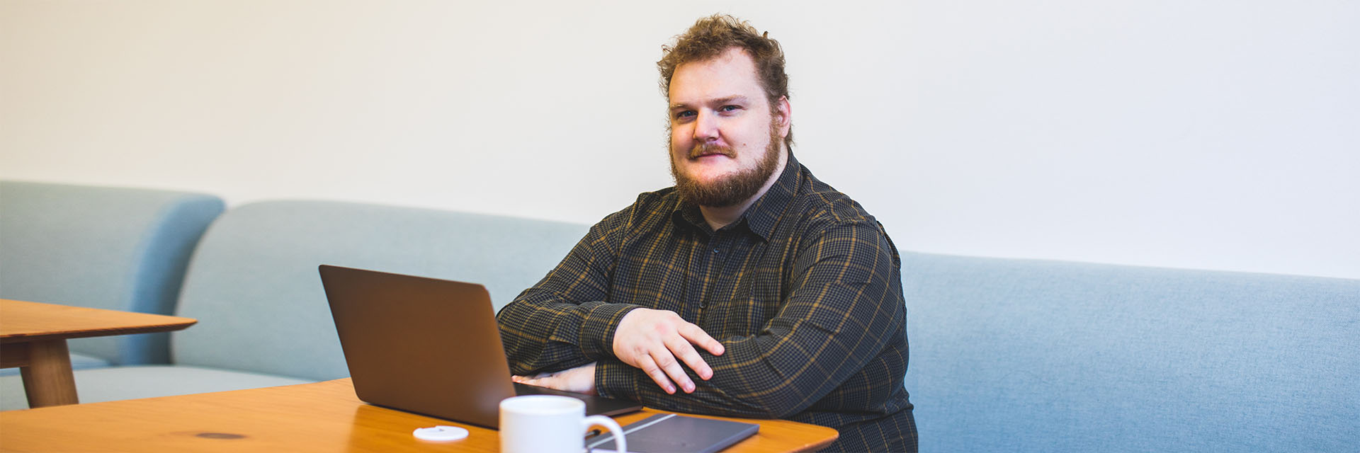 Plus size man at computer