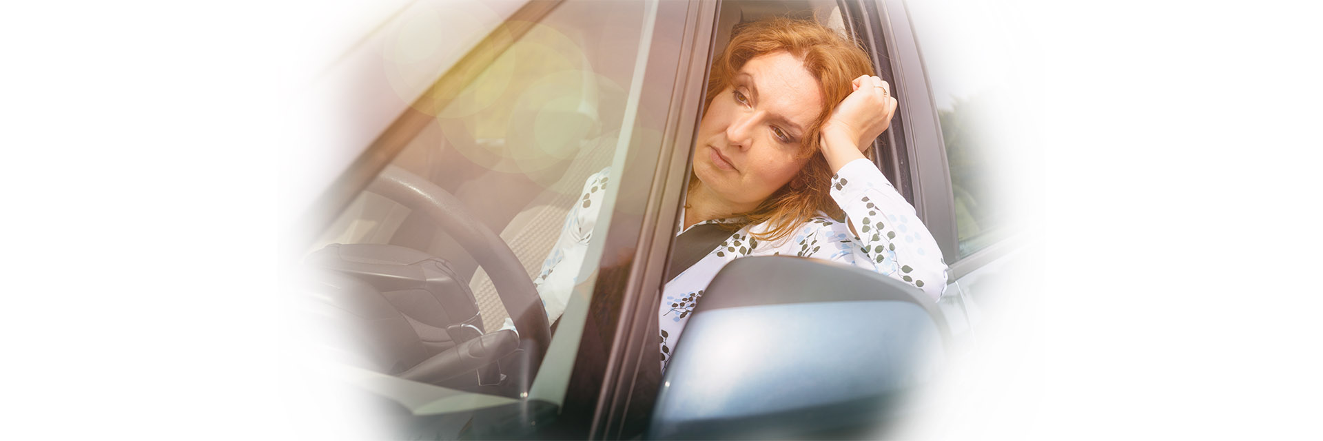 Stressed woman in the car