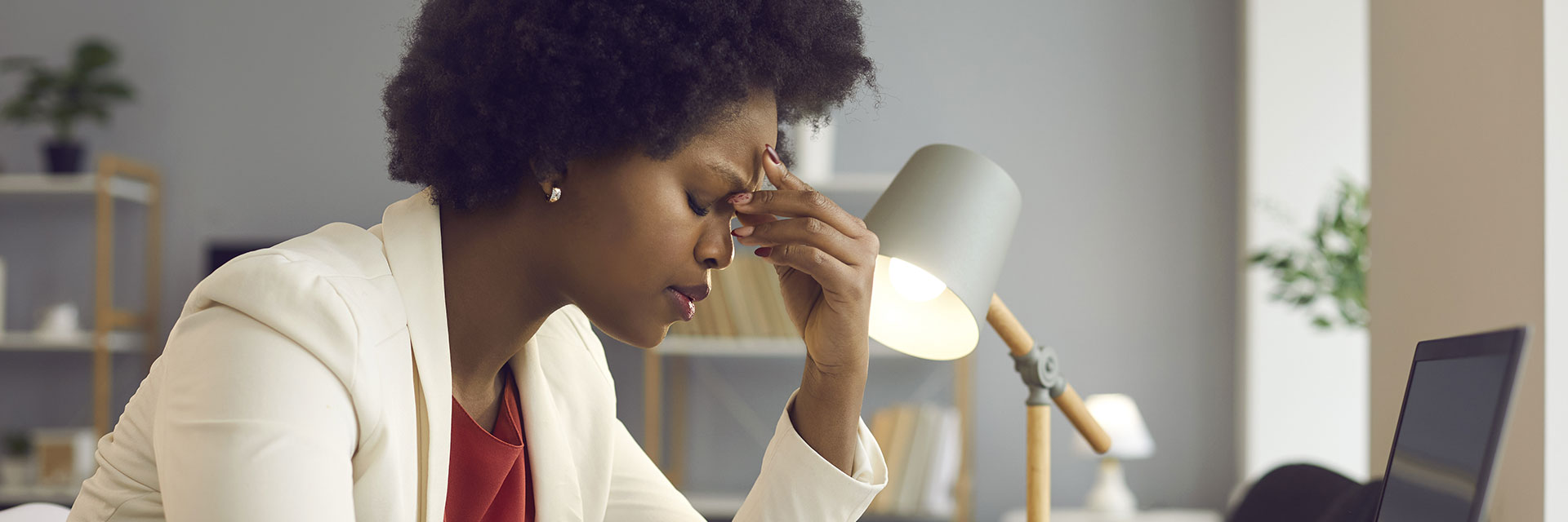 Woman rubbing her due to stress