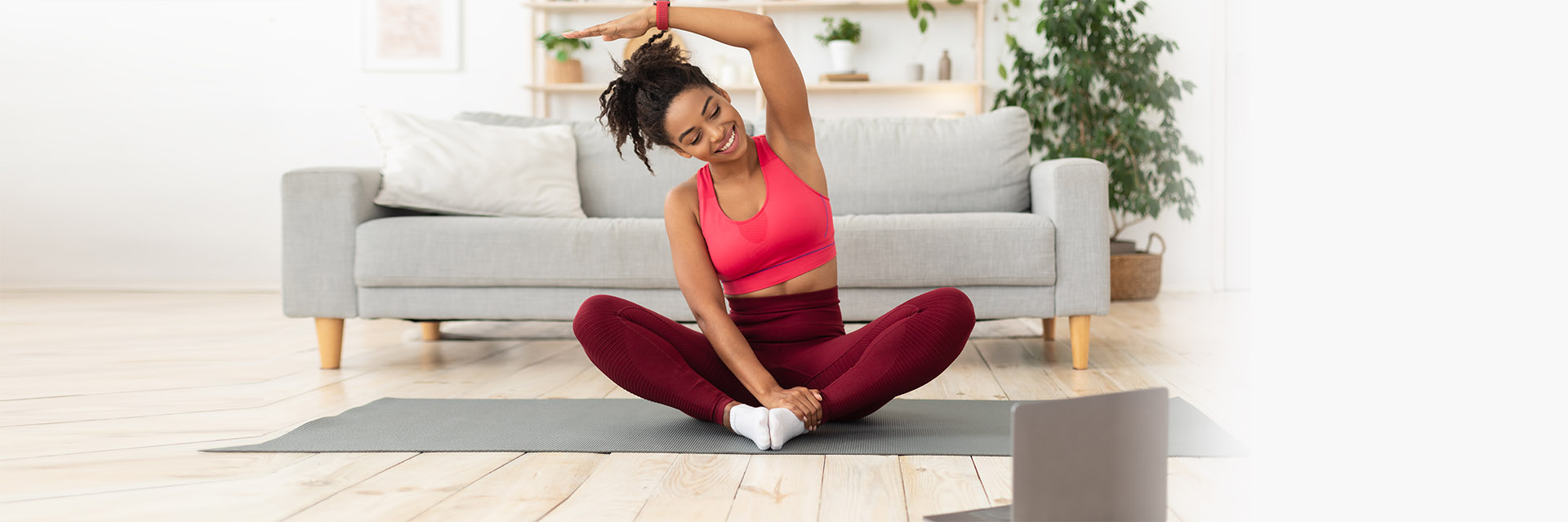 Woman doing yoga on the floor