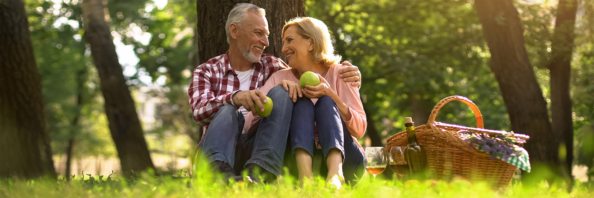 Mature Couple having picnic outdoors