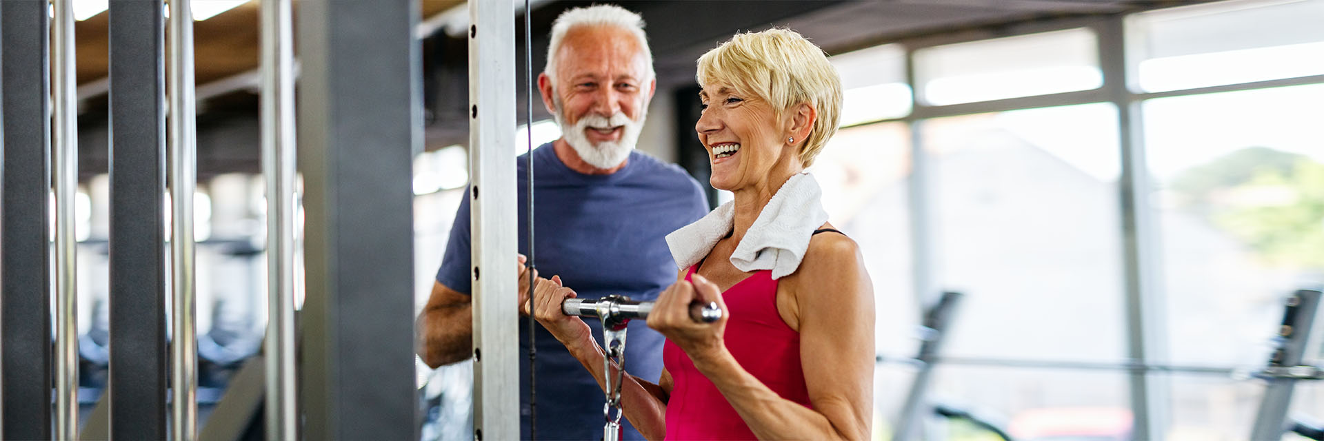 Mature Couple smiling while at the gym