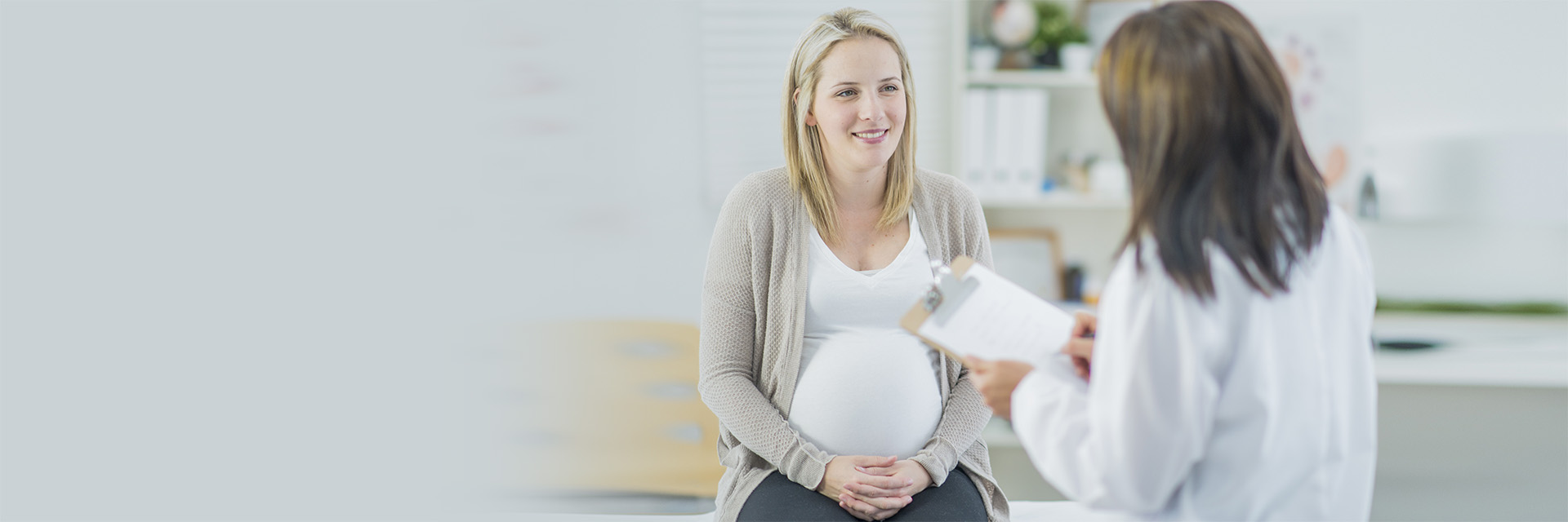 Pregnant woman at exam