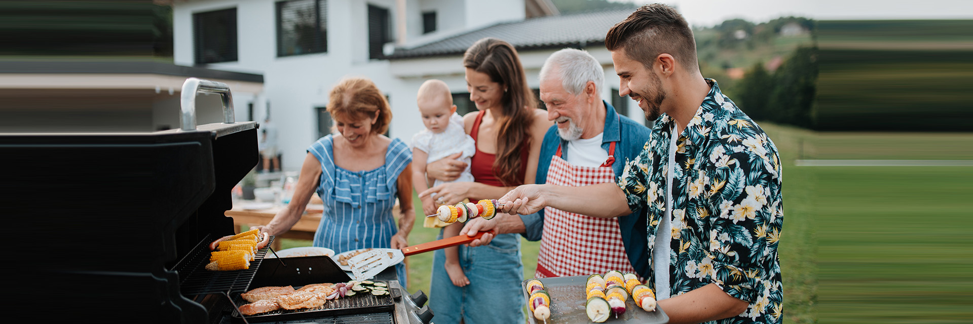 Family having outdoor cookout