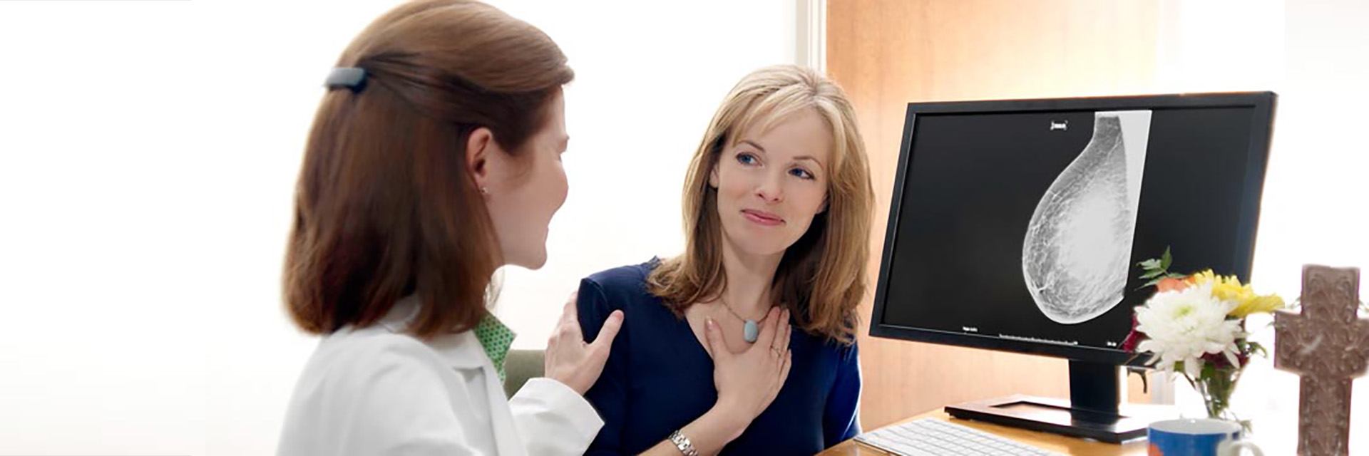 Doctor and Patient Reviewing Mammogram