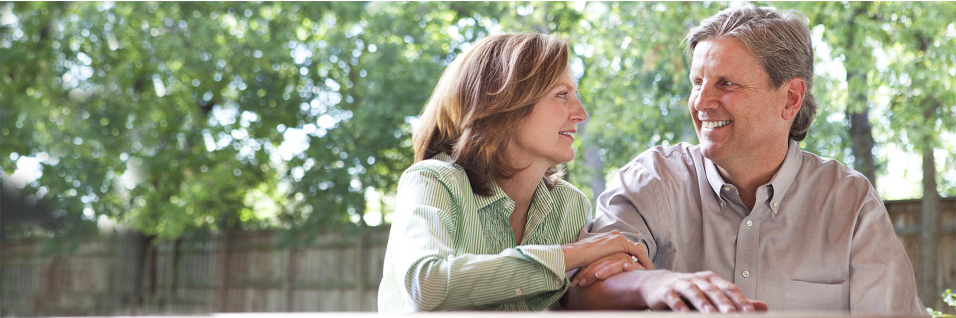 Couple Sitting Outdoors