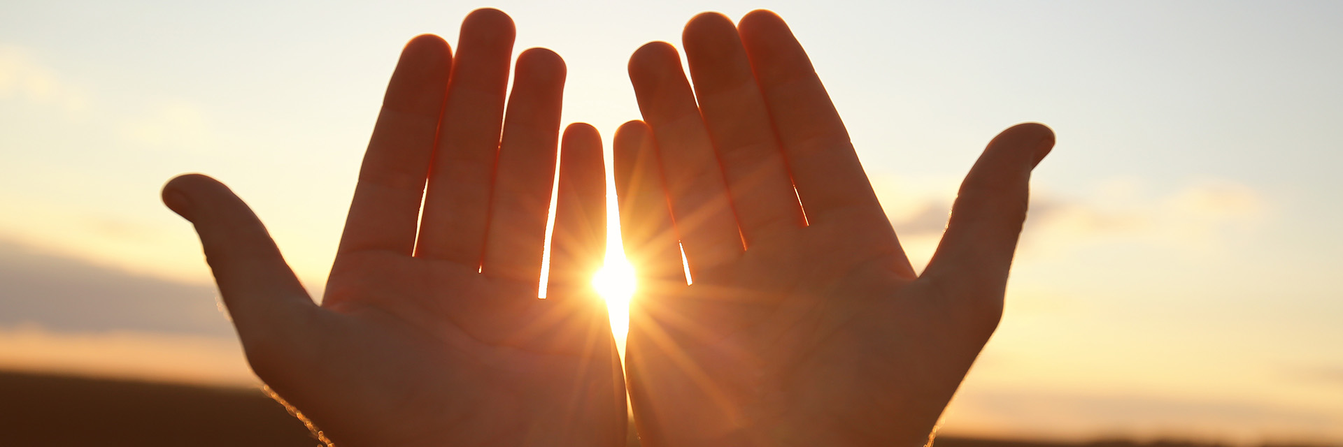 Hands in the sun