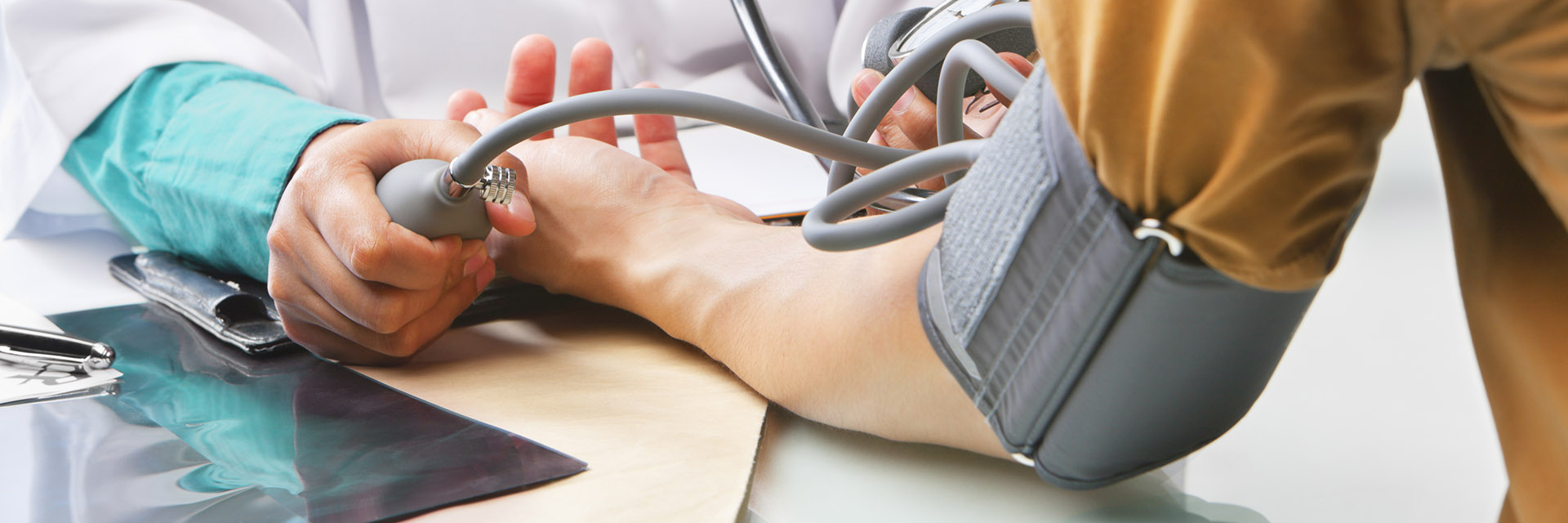 Man Having his blood pressure checked