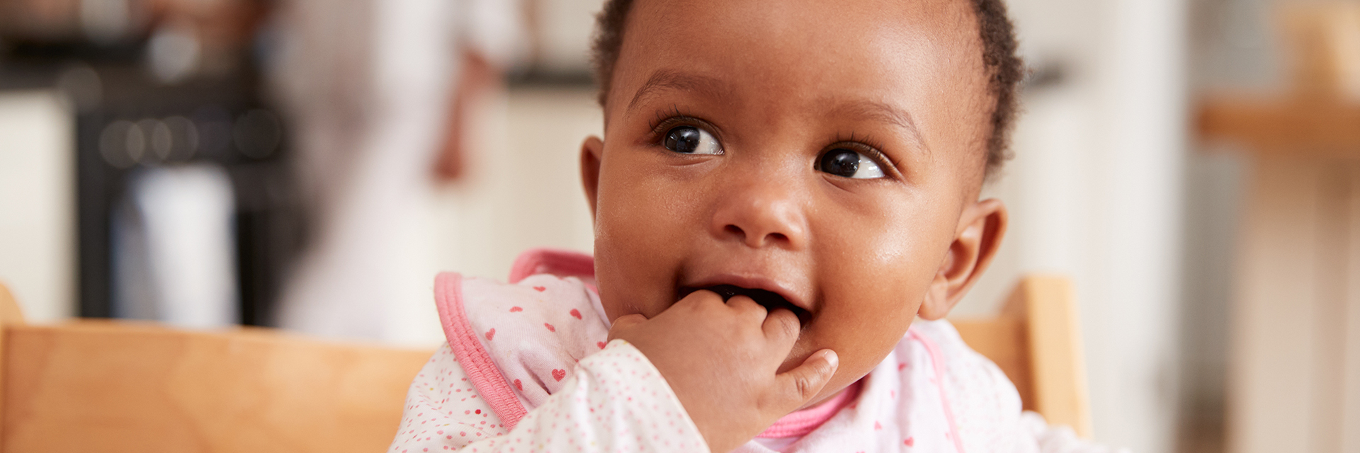 Baby with hand in mouth