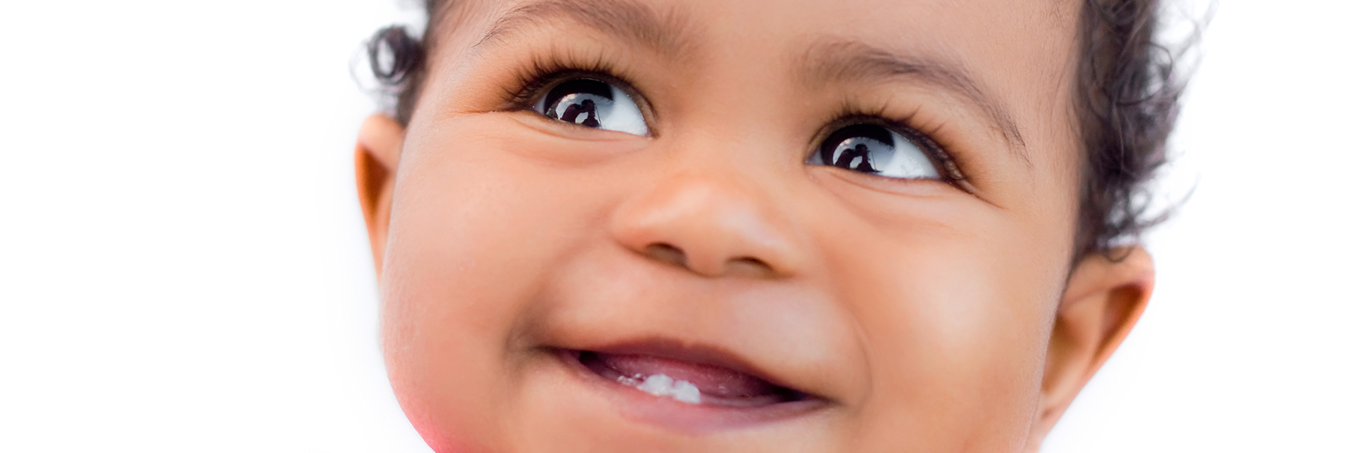 Smiling infant girl