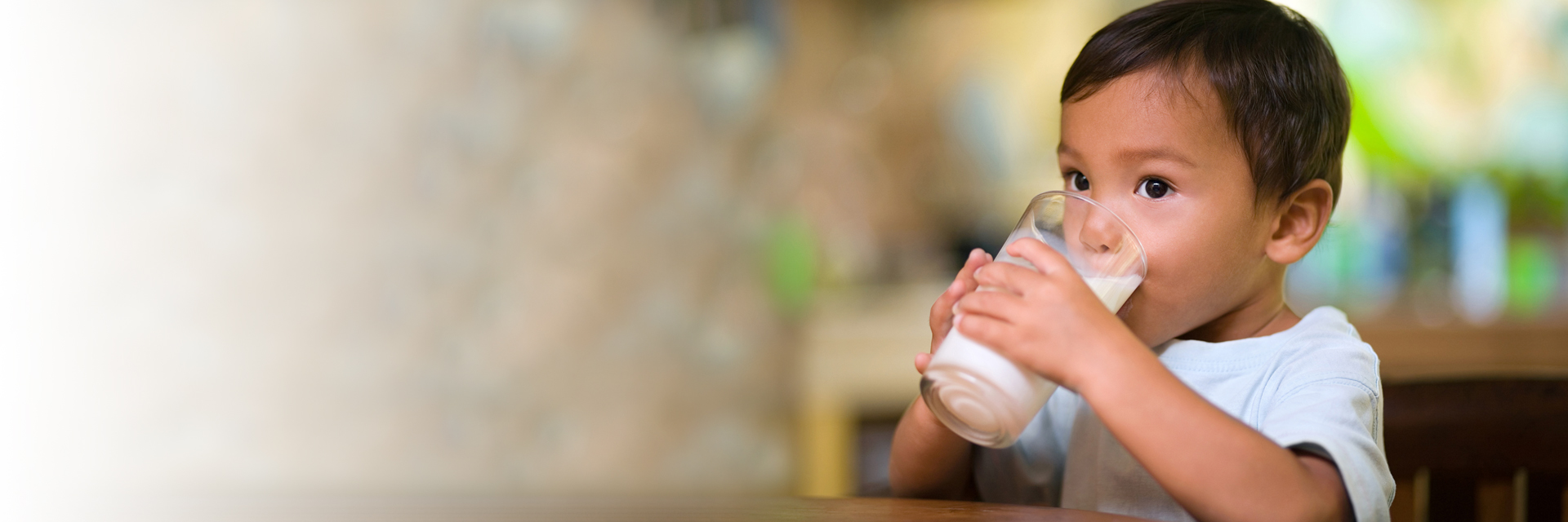 Little boy drinking milk