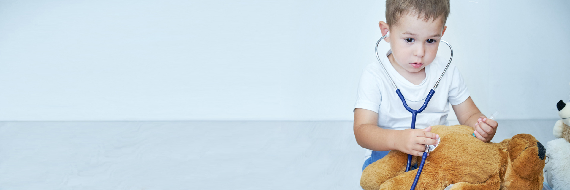 Little boy playing doctor