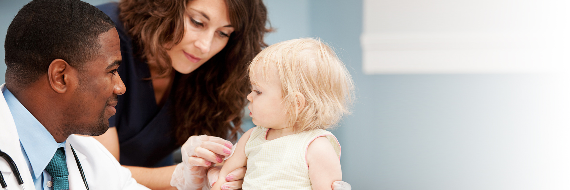Baby girl getting vaccinated