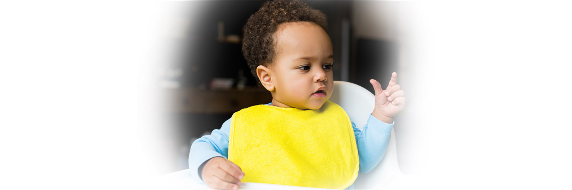 Baby boy in highchair